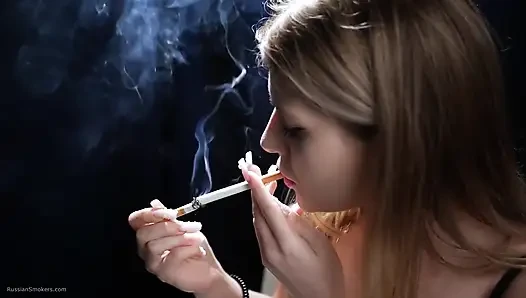 Sexy Blonde Is Smoking Two Reds in a Row