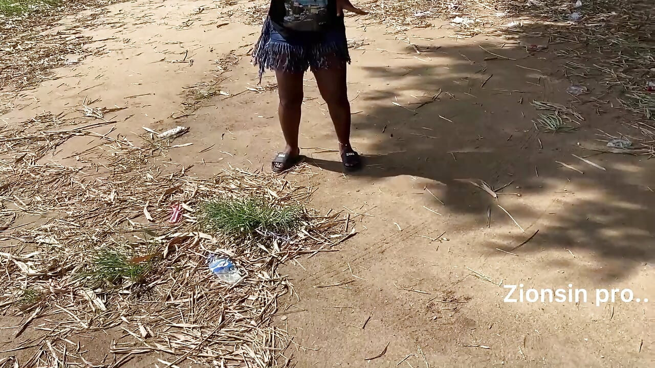 Ebony sexy black girl dances in outdoor with much laughter