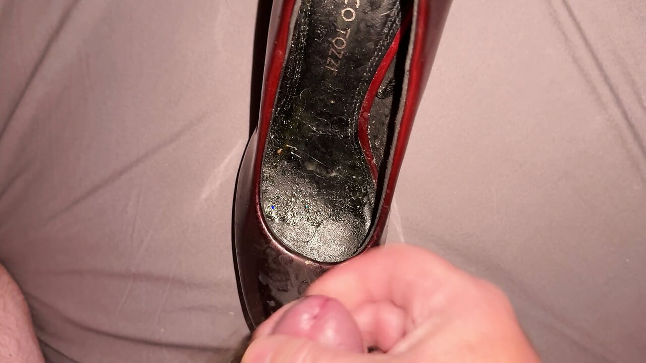 Cumming on red and black patents
