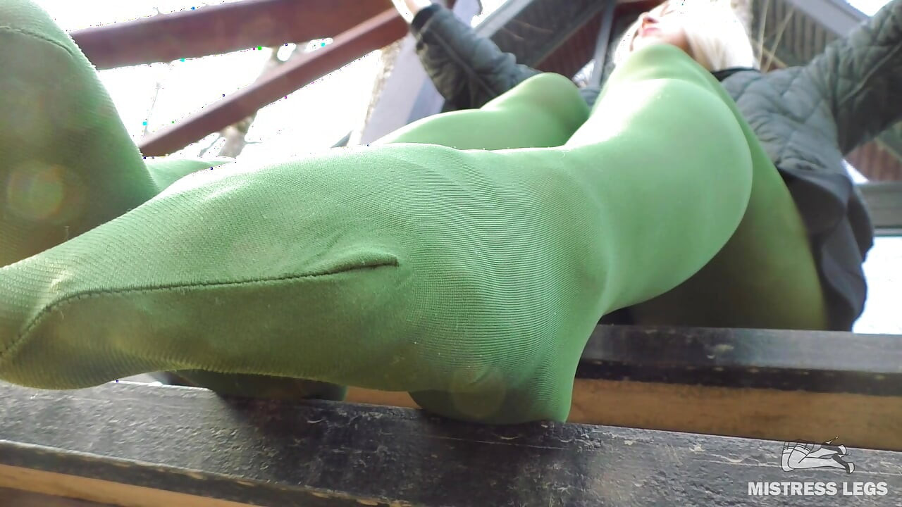 Goddess in Green Pantyhose Teases with Her Feet on the Porch