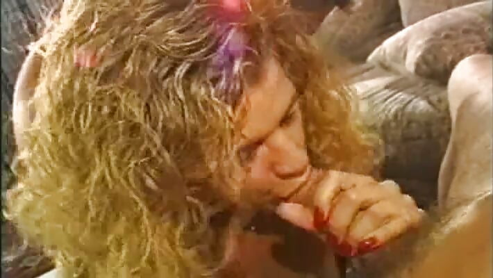Curly Blonde Slut Gags on Cocks in Group Orgy