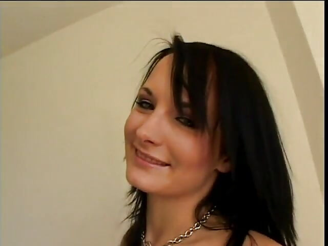 Slender brunette with a pierced tongue sucks the cameraman's cock