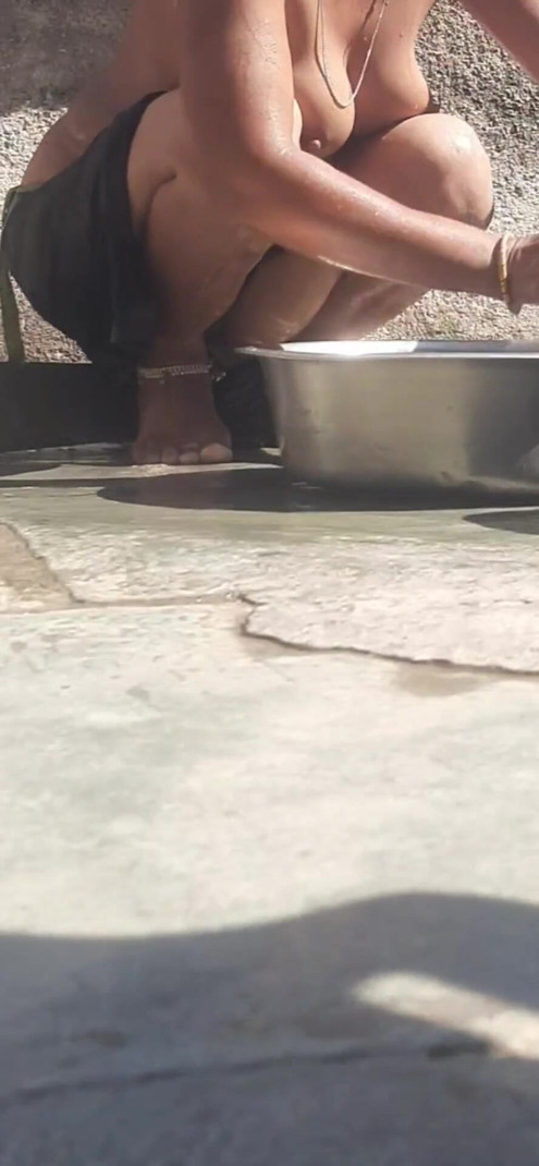 The desi sister-in-law of the village is showing off her beautiful burr by cleaning her pussy hair in the open bathroom | Clip 1