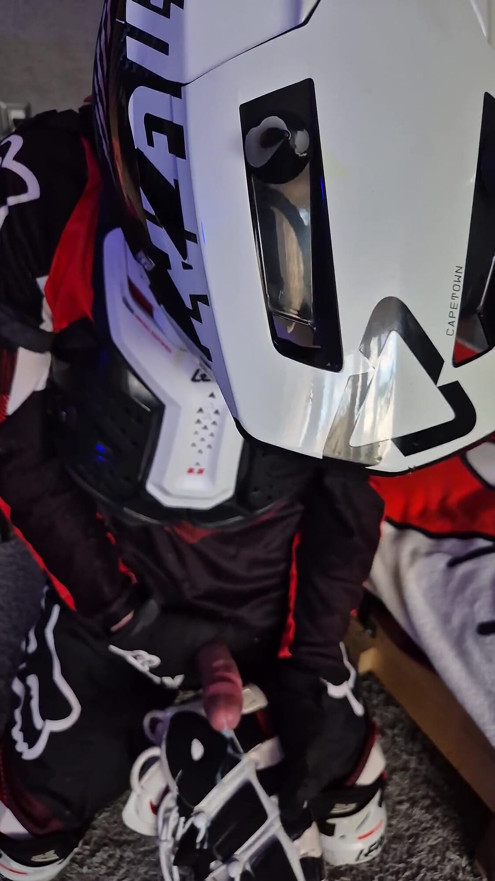 An Excited Guy in Motorcycle Gear Fucks His Sneakers