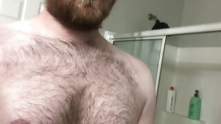 Hairy otter squirts on floor, shows off balls