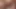 Redhead ladyboy in colorful dress rides her lover's cock in