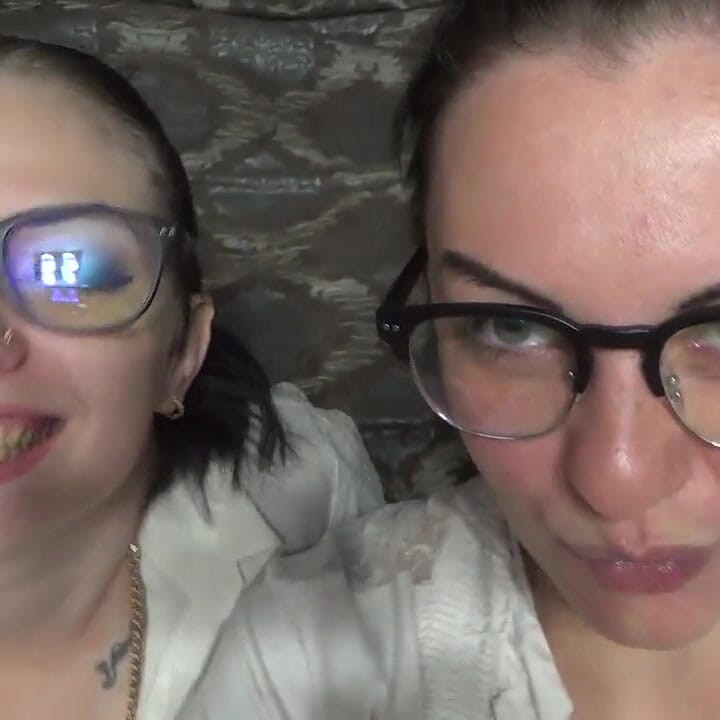 Two business women taunt you with their mouths & tongues before eating you whole!