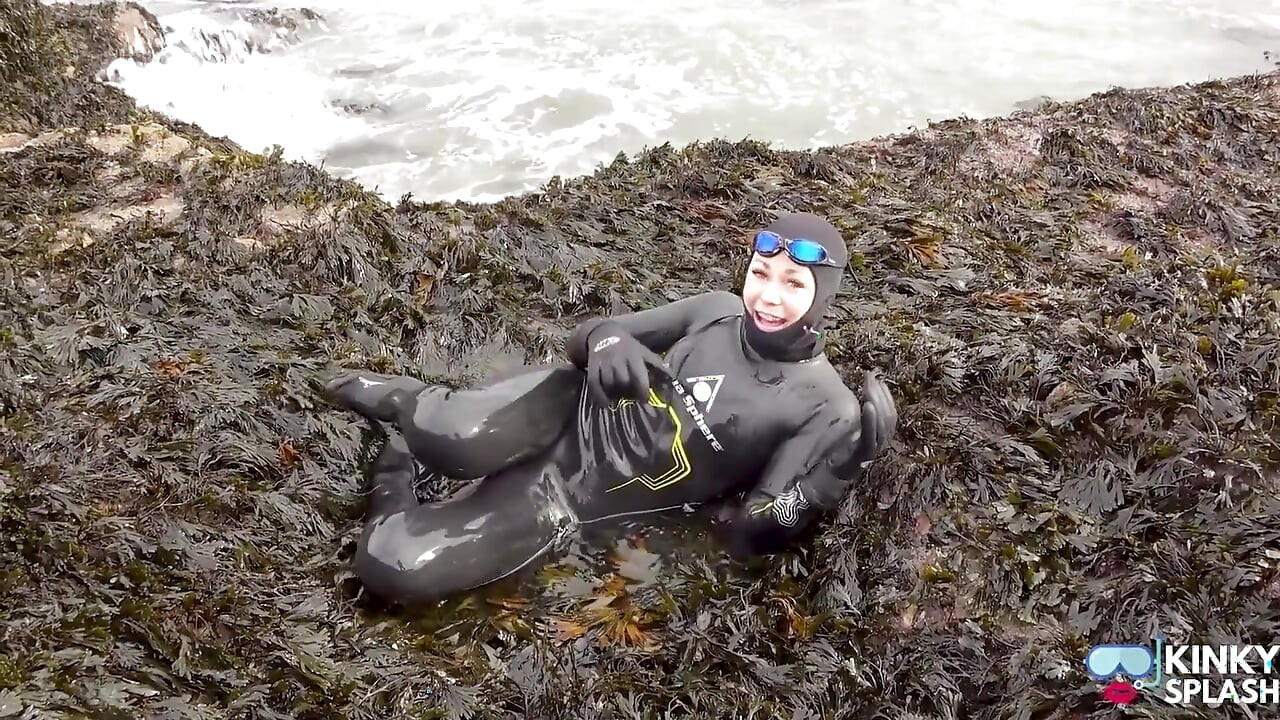 Rubbery Beach Encounter: Lucy's Neoprene Pussy Play with Stranger