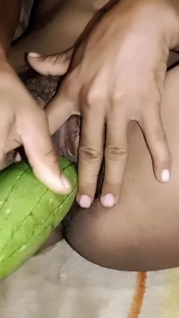 Captivating moment from "Indian hot bhabhi inserted cucumber in her pussy for the first time"