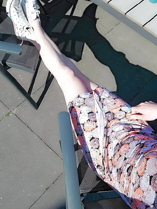 Annemieke dressed up and playing in the backyard