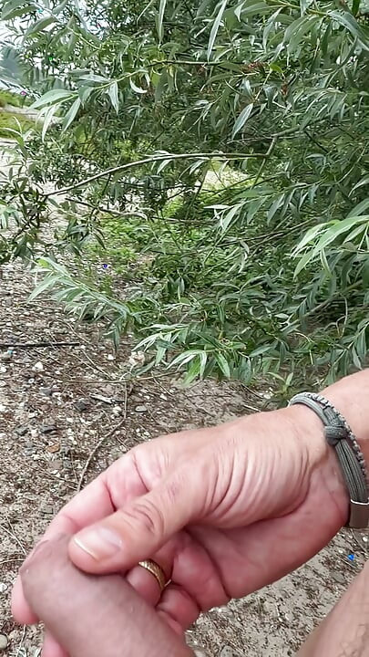 Jerk off and big load by the river