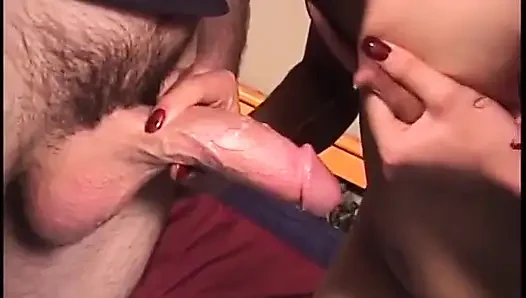 Brunette with small tits sucks a hard cock at home