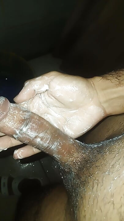 Slim man grabs his penis as a toy and starts masturbating all the time he was in the bathroom while they were not at home alone