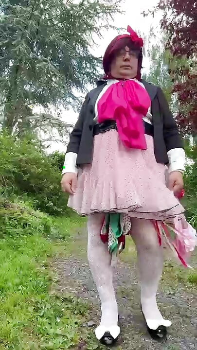 Dressed in a pink polka dot skirt for a party