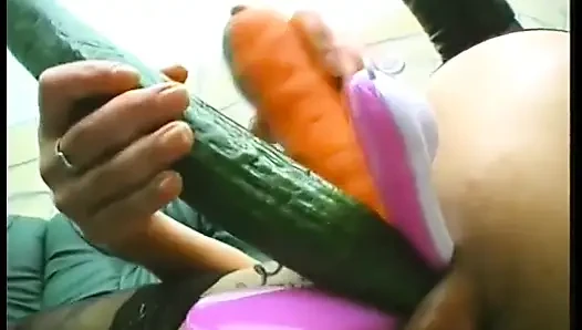 Brunette mature slut wearing stockings while drilling her holes with food and huge candle