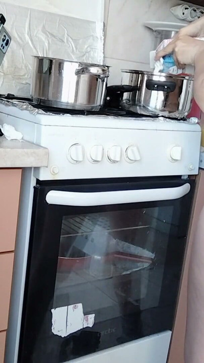Sexy Latina nude in the kitchen. Sexy naked wife prepares food in the kitchen. | Clip 1