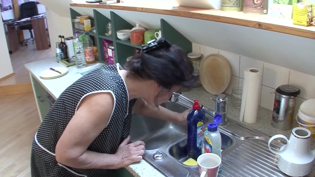 Cleaning lady 57 Helga fucked in the kitchen