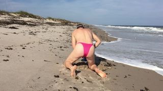 Bikini rosa sexy en la playa