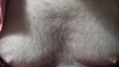 man shows doctor his breasts