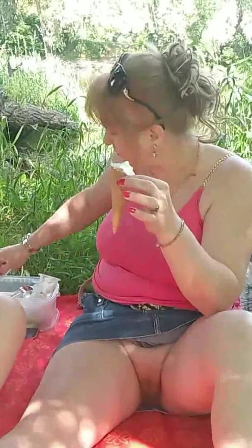 Two women Mature milf and teen virgin without panties under skirt eat sweet ice cream and kiss lips Outdoors Lesbians Sex Public | Clip 1