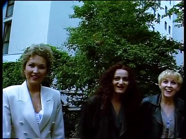 Classy german females giving an outdoor interview