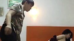 Chinese lesbian tomboy fingers her girlfriend on their bed