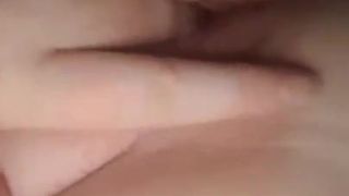 Slut fingering herself