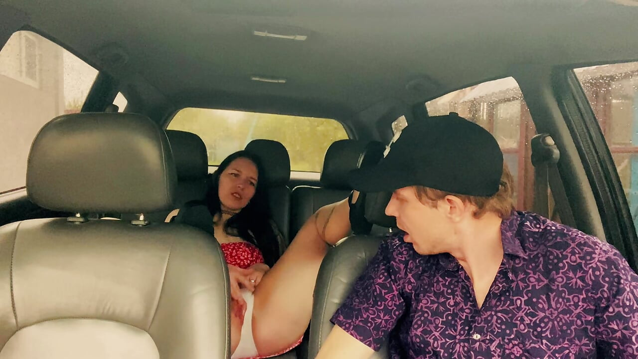Wife cheating with a taxi driver in the car outside the house