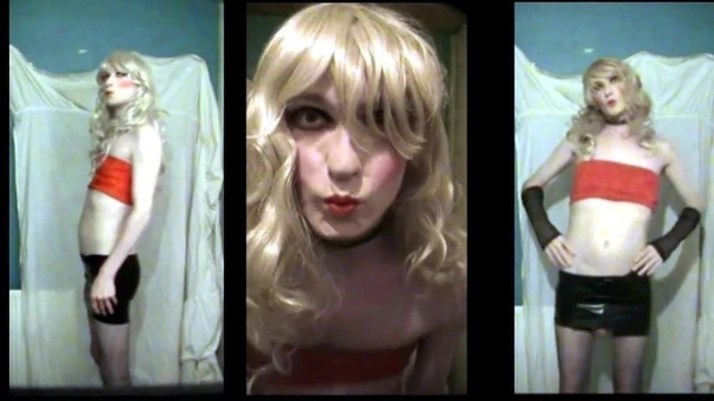 Sissy SandraCduk posing in red top and black skirt