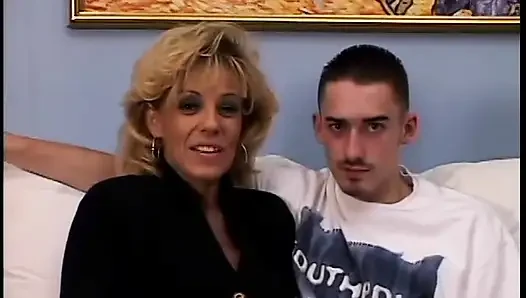 Hot blonde gets bent over and fucked doggystyle on the couch