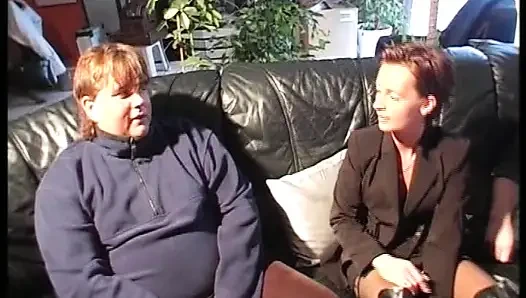 Sexy German slut in stockings takes care of two cocks