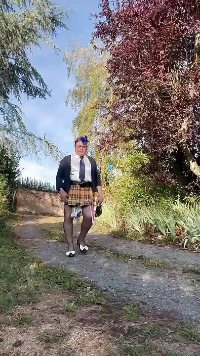 Dressed in a little yellow plaid skirt for a night out