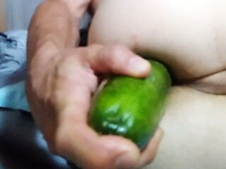 Anal playing with massive cucumber