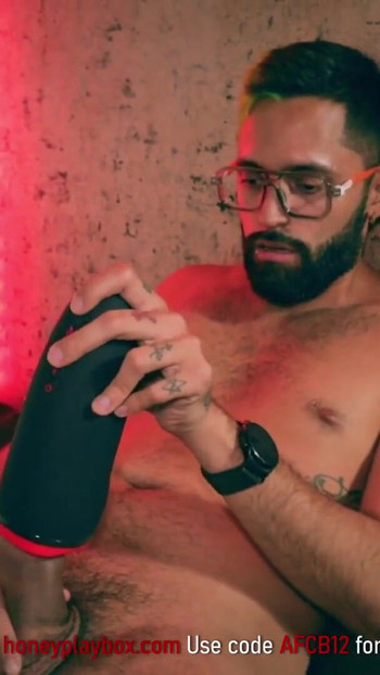 Stunning moment from "Big Cock Latino Camilo Brown Testing Honeyplaybox Dayo Vibrating, Heating and Clamping Masturbator"