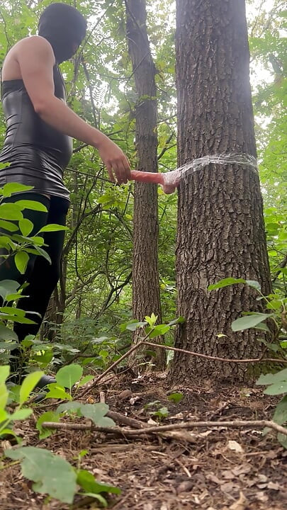 Sissy bitch had an extreme dildo fuck in the park and experienced a pygasm in a chastity belt