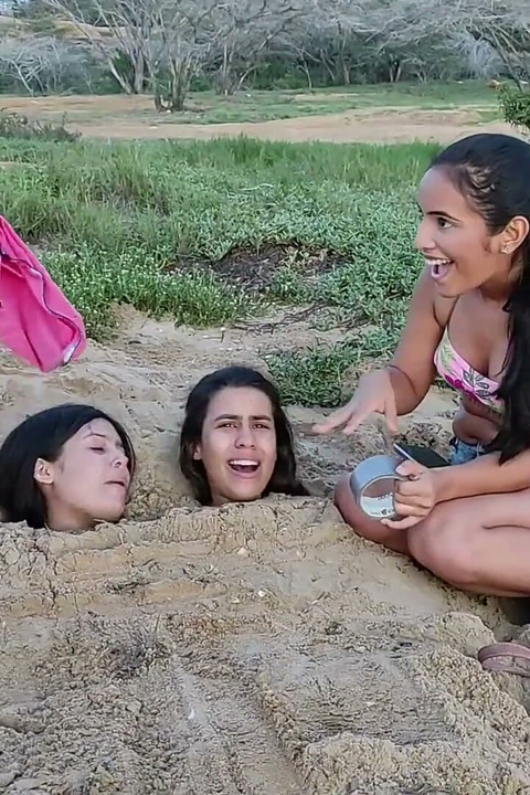 Buried by the Beach Bitches!