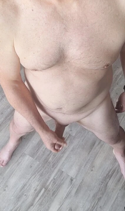 Watching from above as exhibitionist masturbator enjoys a good stroke