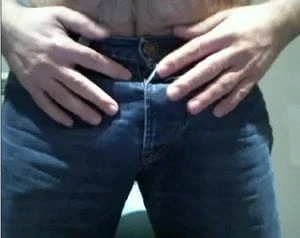 HAIRY CUB TEASING HIS COCK IN BLUE JEANS
