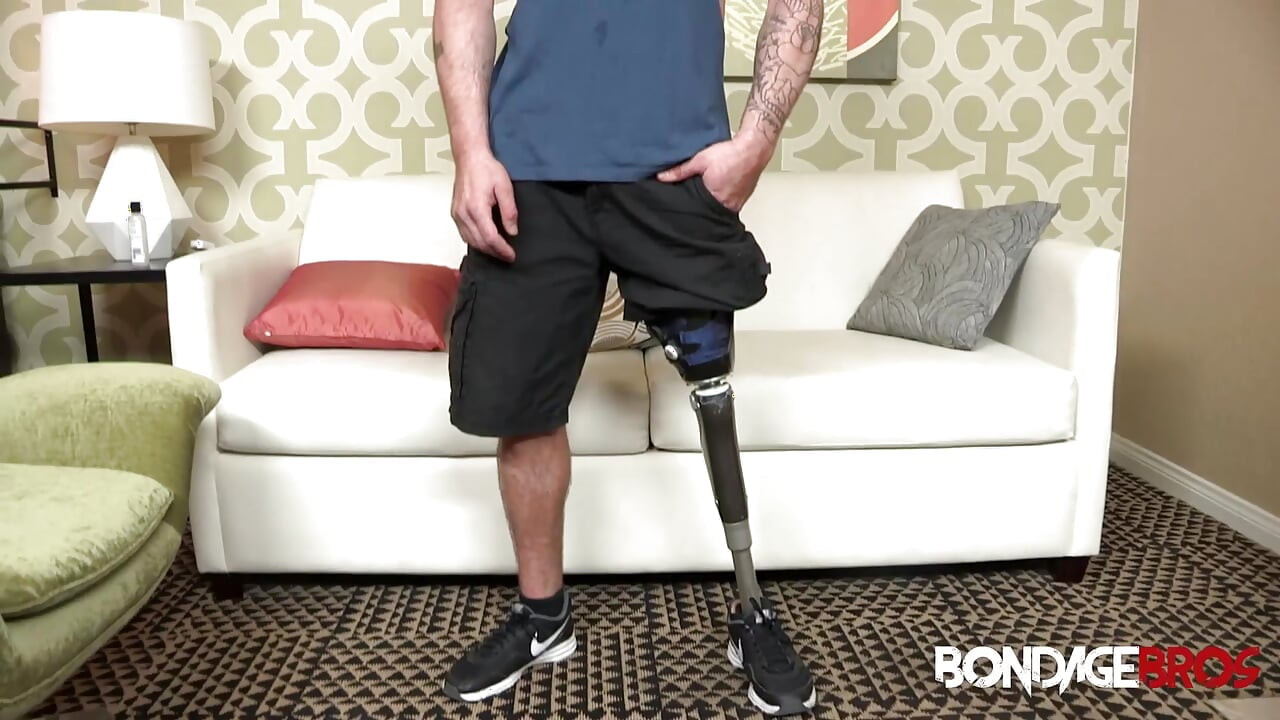 BondageBros: Tattooed Hunk Nick Blue Eyes tugs his veiny meat