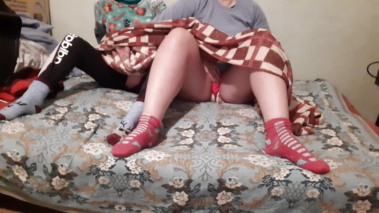 We mutual masturbate under the covers while our stepparents watch a movie next to us