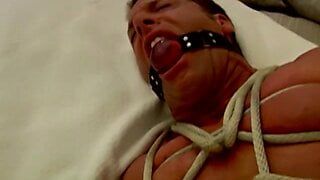 Cute muscular guy Derek tied up and gagged