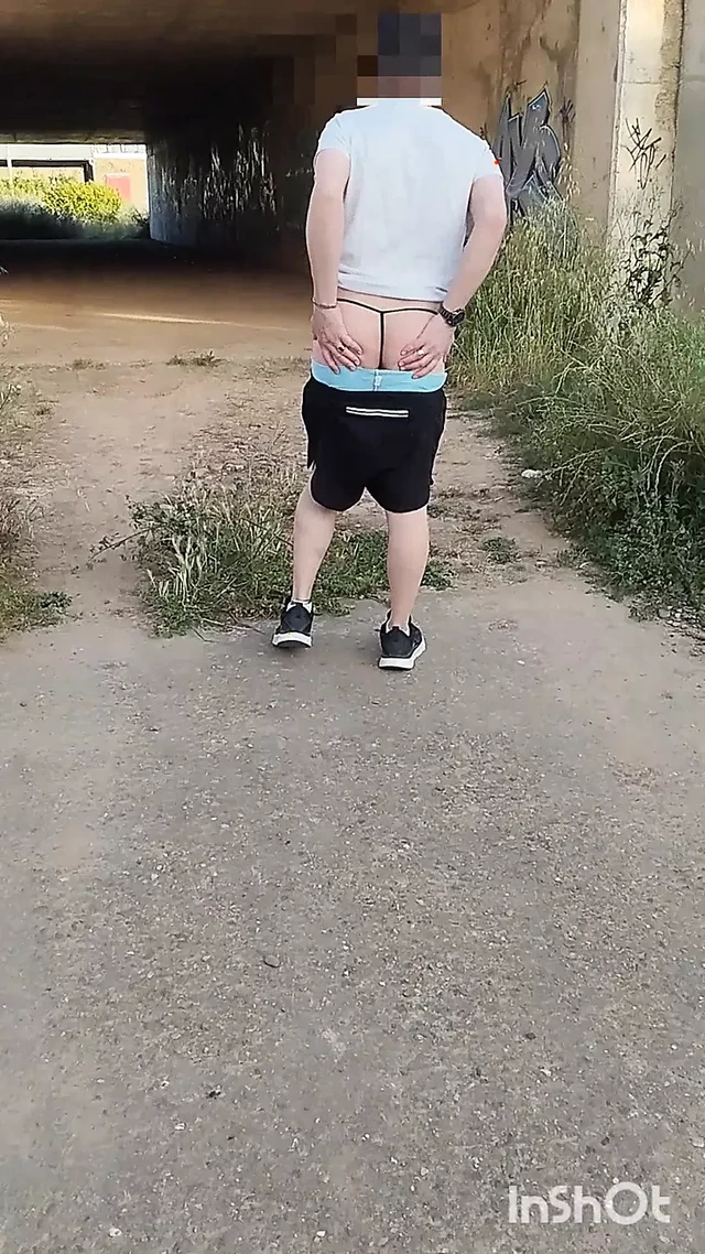 In Showing Her Ass in a Thong