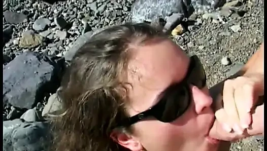 Curly-Haired teen sucks older guy's cock at the beach then fucks