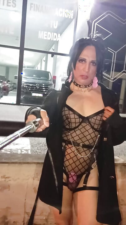 Taniax walks around the city in sexy black lingerie,showing her tiny cock in flat chastity cage