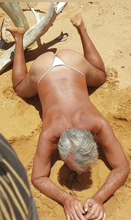Ladysilva on all fours wanting cock in her hot ass on the beach