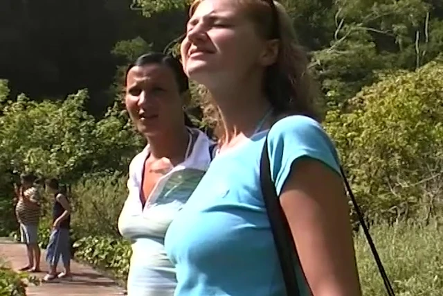 Stunning German lesbians pleasing their pussies on the beach