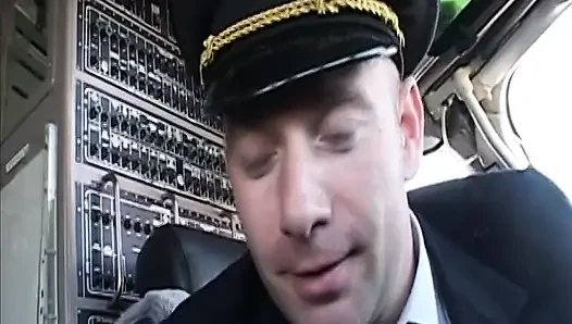Randy pilot fondles sexy brunette in the cockpit