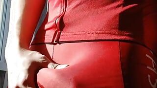 Cute sexy twink takes off tight red cycling suit