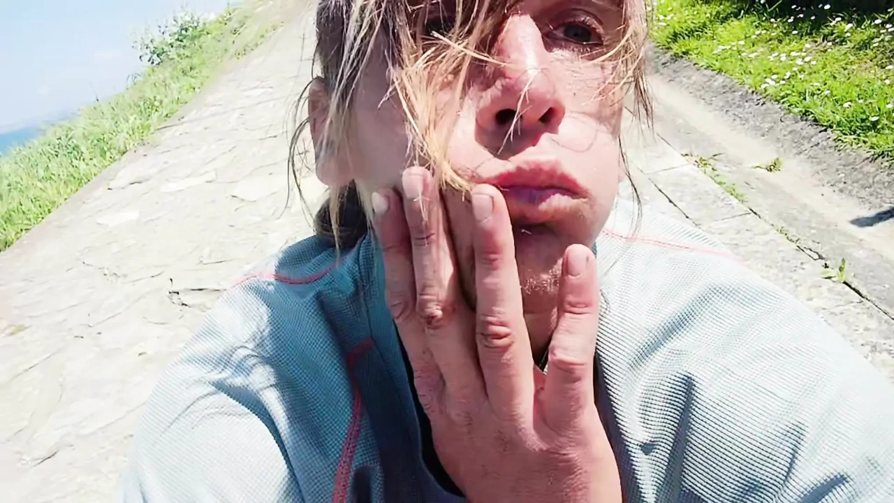 Sexy Guy on the Beach Clearing a Little