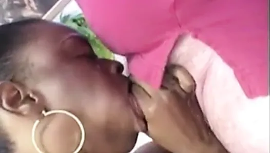 Busty ebony Lola licking and sucking white cock